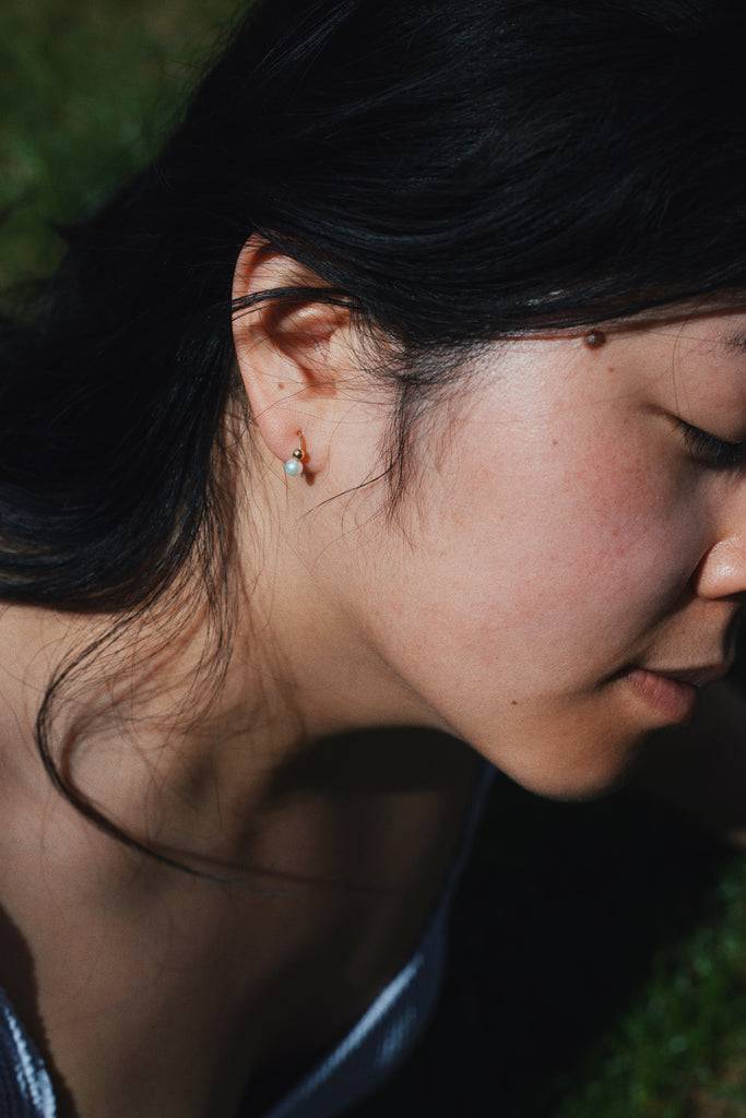 JUKSEREI VOYAGE BUBBLE TWIST EARRINGS