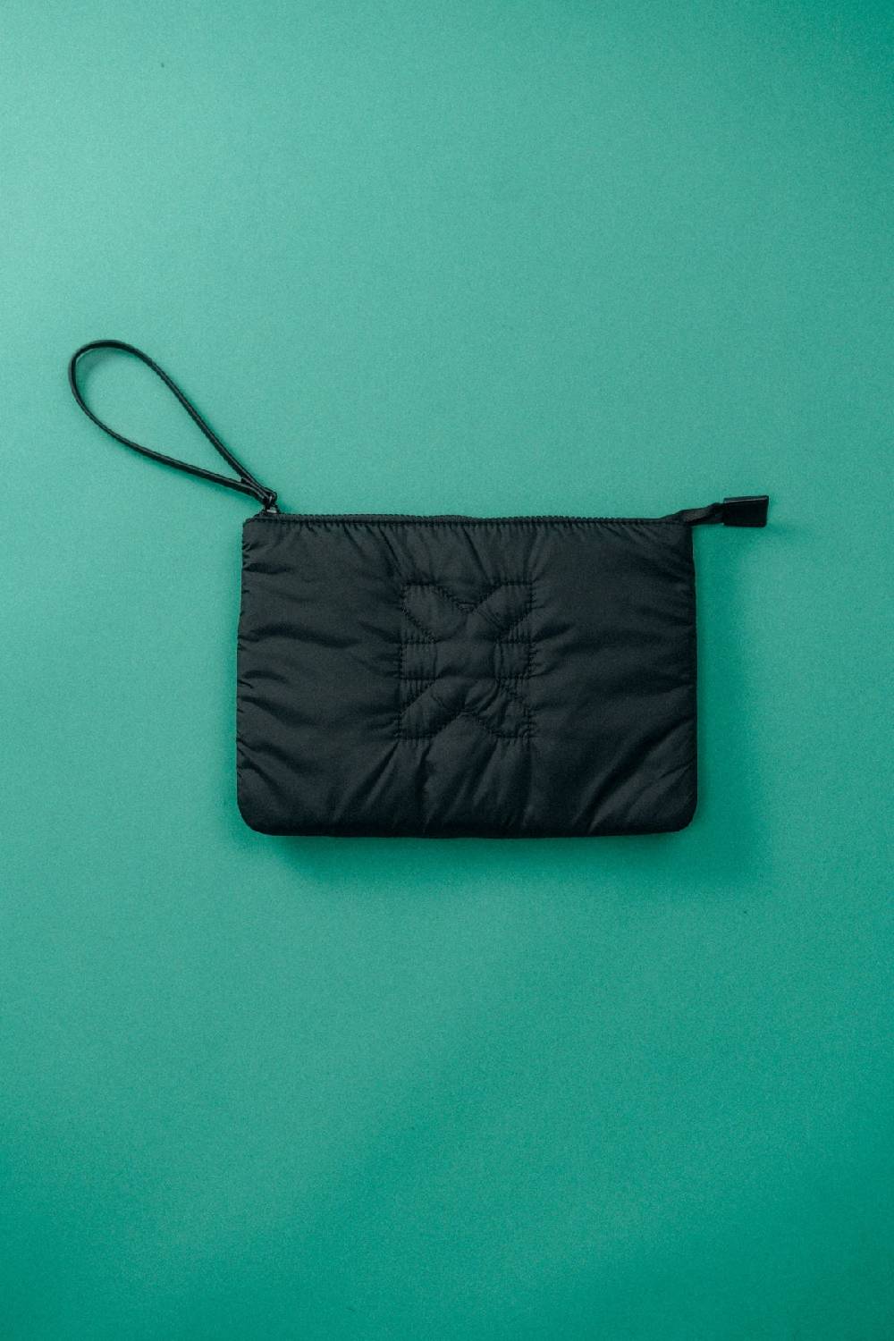 Karo Kauer Clutch Logo