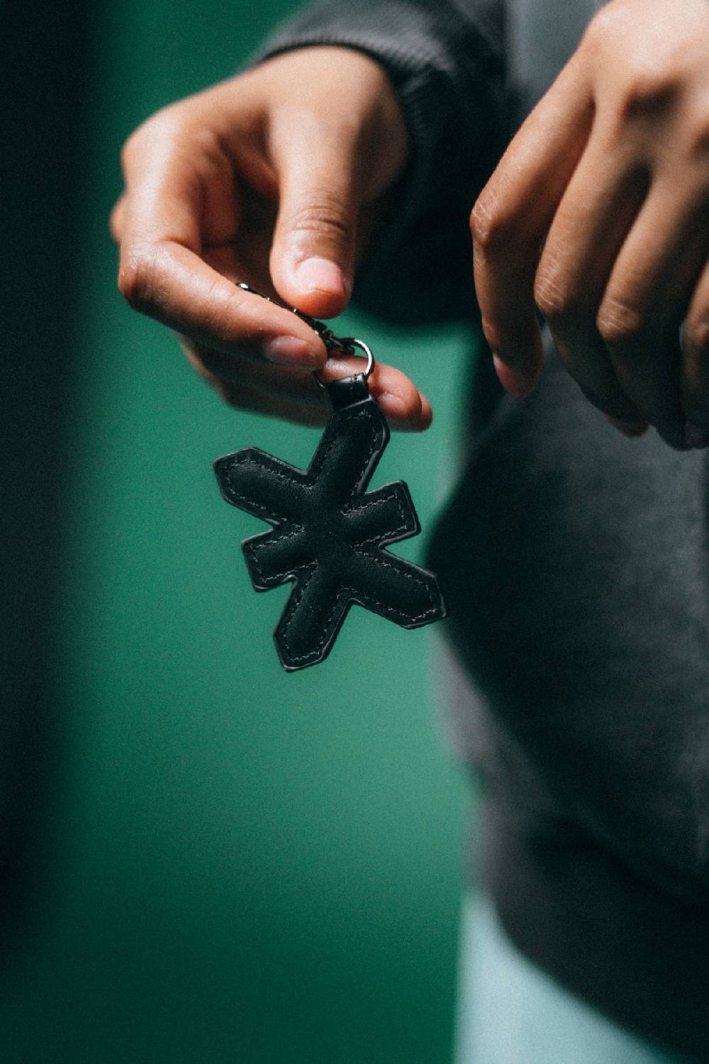 Karo Kauer Puffer Charm Logo