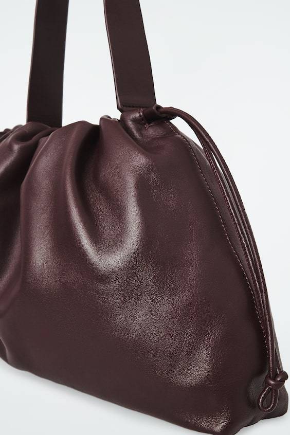 HM CAVATELLI CLUTCH AUS LEDER