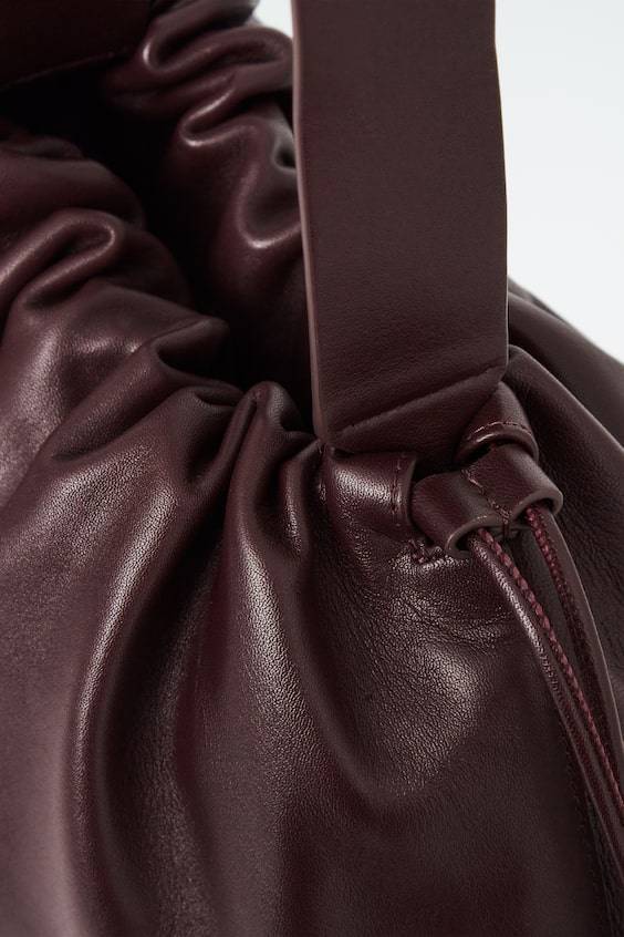 HM CAVATELLI CLUTCH AUS LEDER