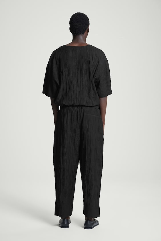 HM HOSE IN KNITTEROPTIK MIT WEITEM BEIN