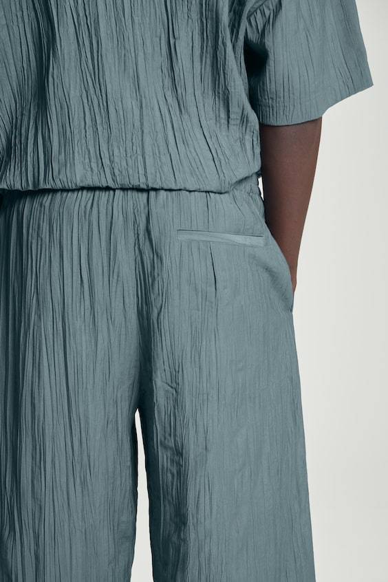 HM HOSE IN KNITTEROPTIK MIT WEITEM BEIN