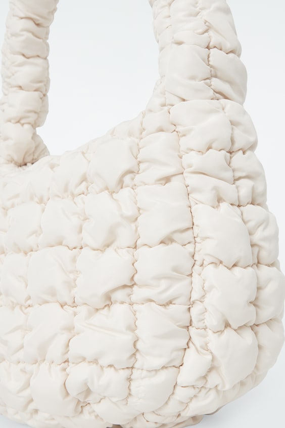 HM KLEINE GESTEPPTE TASCHE