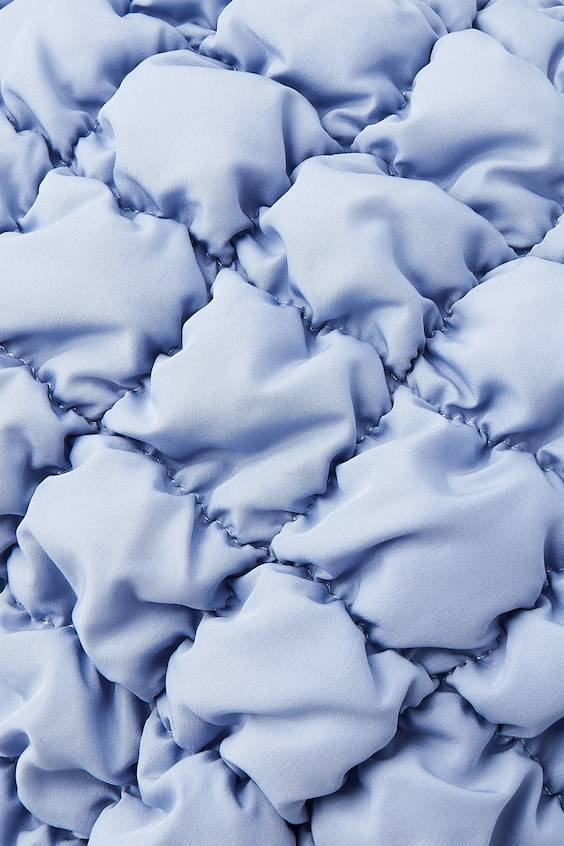 HM KLEINE GESTEPPTE TASCHE