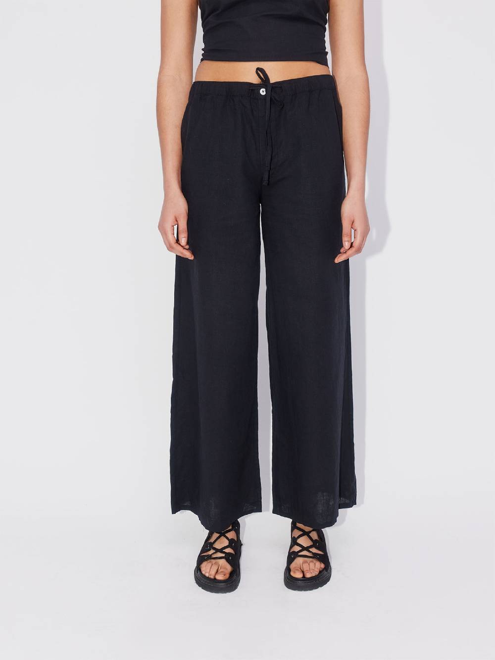 ABOUT YOU REBIRTH STUDIOS Wide Leg Pants 'Holiday' In Black