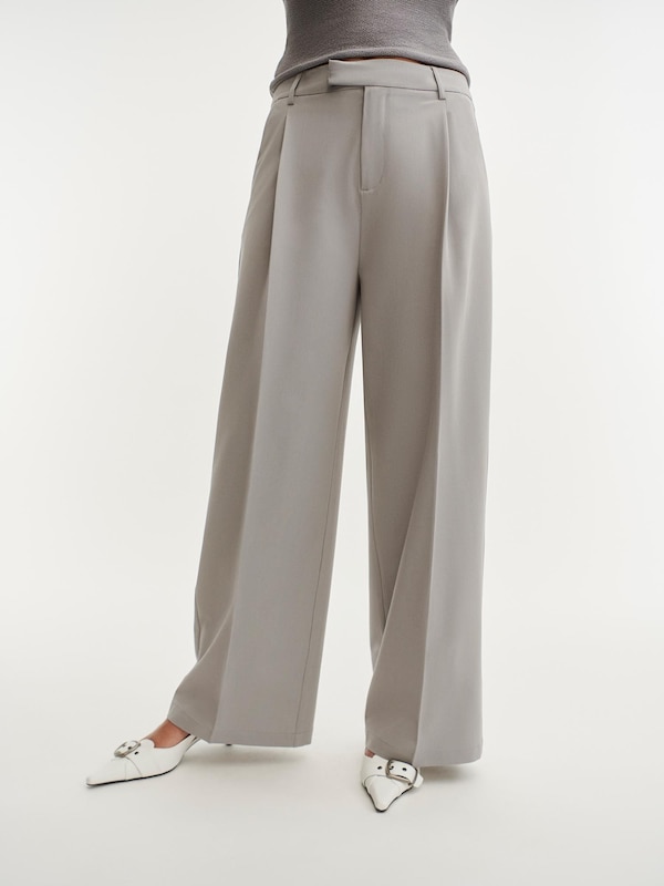 ABOUT YOU x Laura Giurcanu Loose fit Pleated Pants 'Mathilda' in Stone