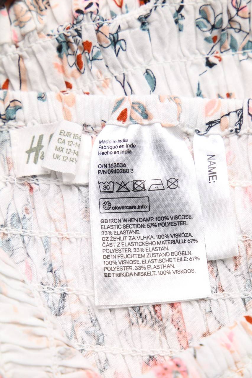 Carou H&M Print-Rock Mit Smok-Details