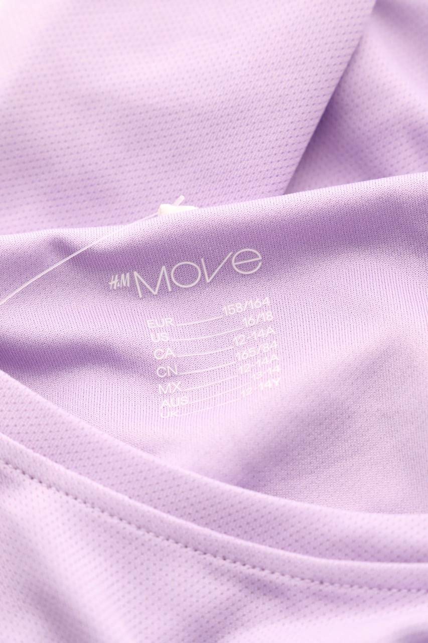 Carou H&M Sport-T-Shirt Mit Statement-Print