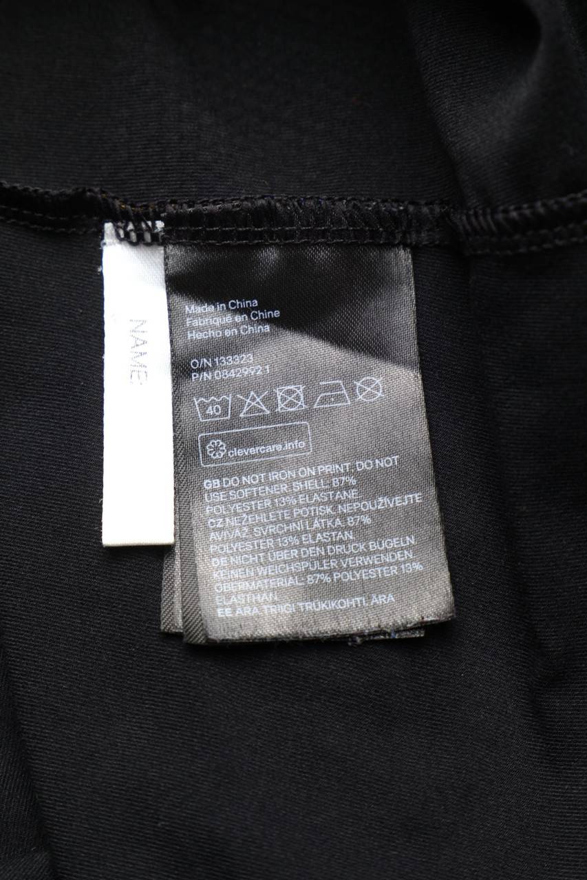 Carou H&M Sport Top Mit Statement-Print