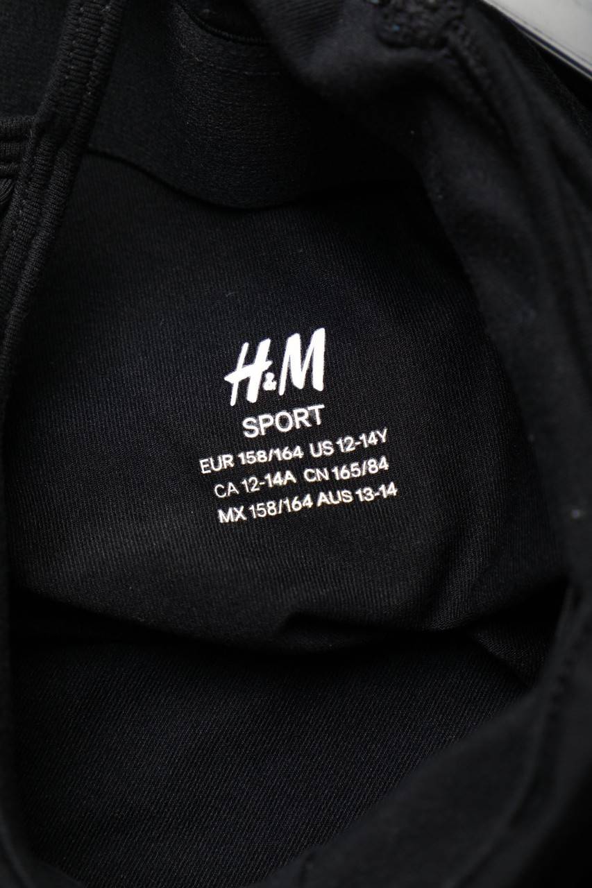 Carou H&M Sport Top Mit Statement-Print