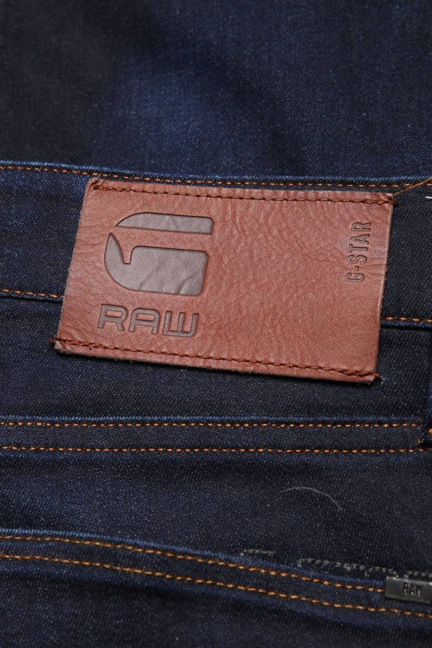 Carou G-STAR RAW Dark Denim Tapered Jeans Mit Logo-Applikation