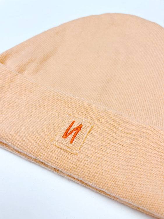 Nonoi Studio MÜTZE "HORA" PASTELLORANGE AUS KASCHMIR