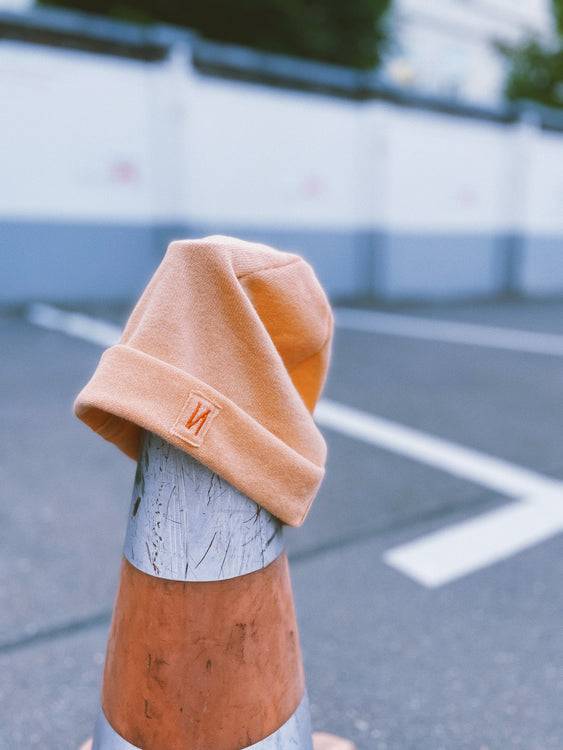 Nonoi Studio MÜTZE "HORA" PASTELLORANGE AUS KASCHMIR