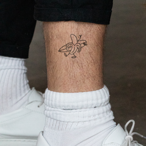 Paul Hewitt Men's Surfing Banana Tattoo