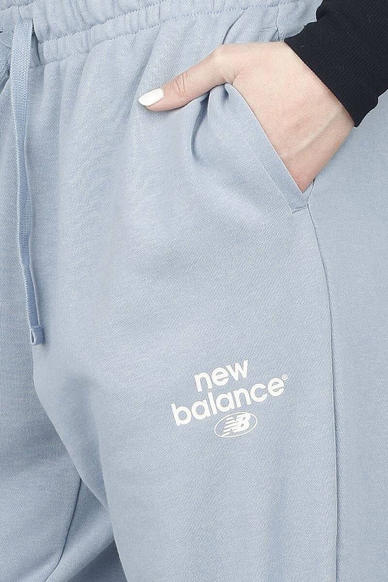 EMP "NB Essentials Graphic Fleece Pant" Trainingshose Blau Von New Balance