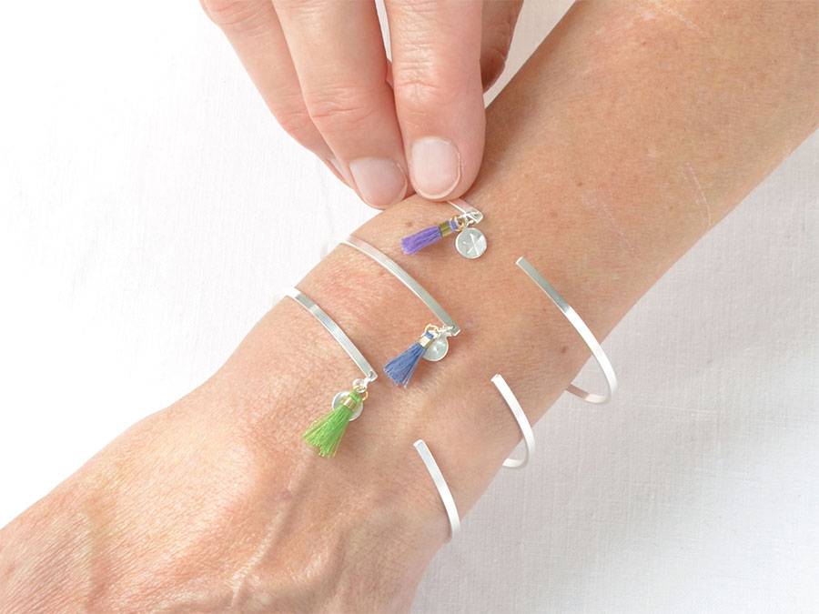 Renna Deluxe Silber Armreif zart und filigran mit Tassel und kleinem Anhänger