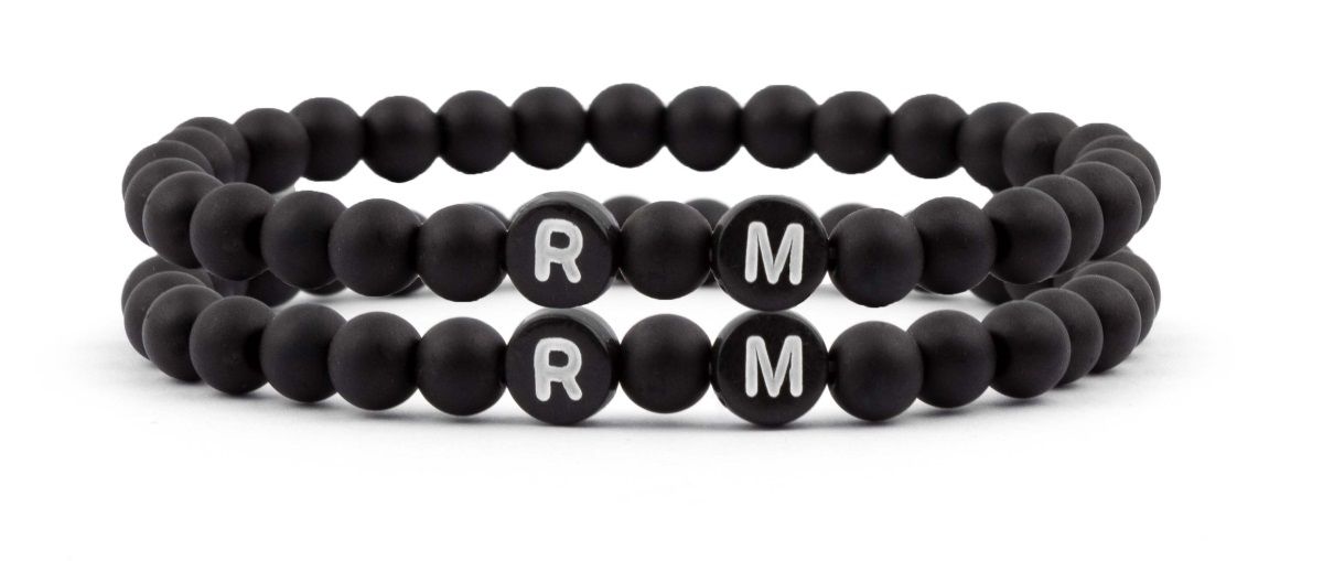 Sadingo Partnerarmband-Set aus schwarzen Acrylperlen