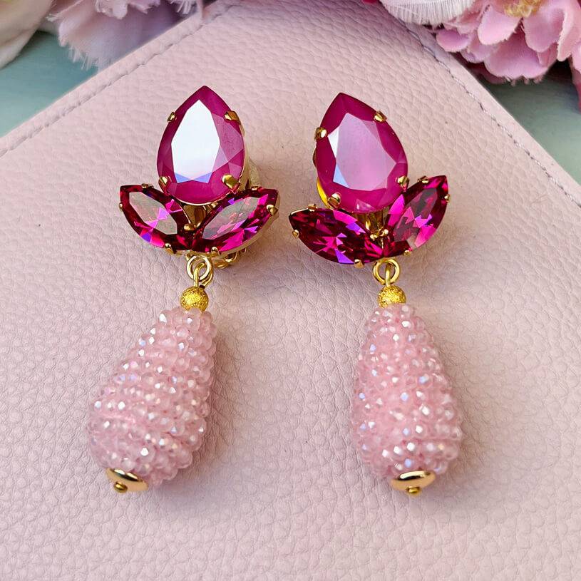 SchwesterSchwester Funkelnde Ohrstecker in Pink mit rosafarbenen Glitzertropfen von AmuseToi