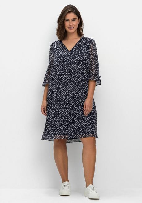 sheego Chiffonkleid im Hängerchen-Stil, mit Millefleursprint - nachtblau gemustert sheego