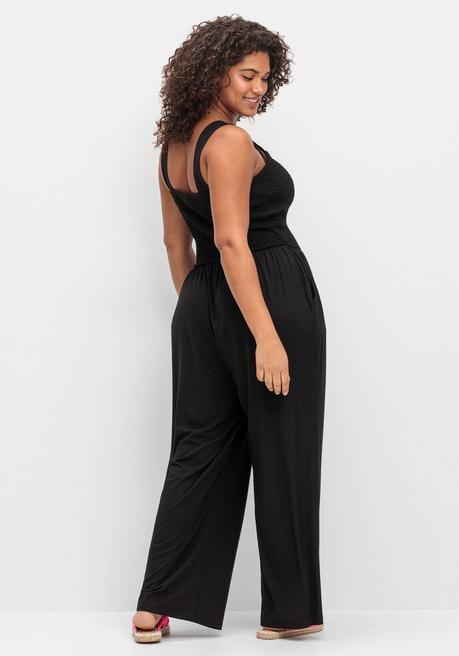 Sheego Jumpsuit Mit Smok-Oberteil Und Weitem Bein - Schwarz Sheego