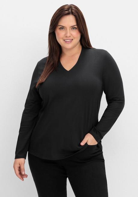 sheego Langarmshirt mit V-Ausschnitt, vorn doppellagig - schwarz sheego sheego Langarmshirt mit V-Ausschnitt, vorn doppellagig - schwarz sheego