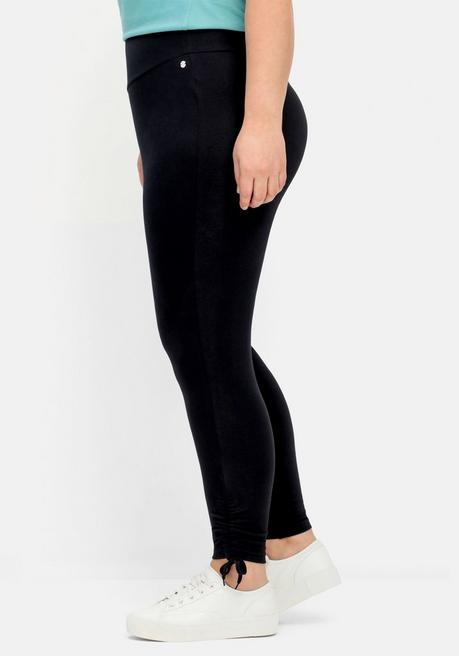 Sheego Leggings Mit Breitem Bund Und Raffung Am Saum - Schwarz Sheego