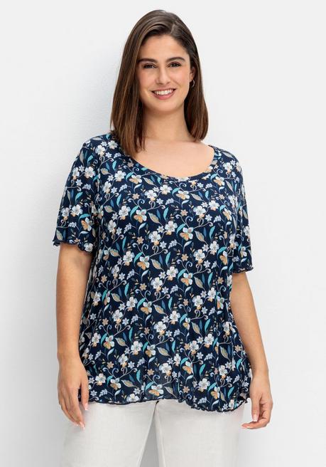 sheego Shirt mit Blumendruck und Cut-out im Rücken - indigo gemustert sheego