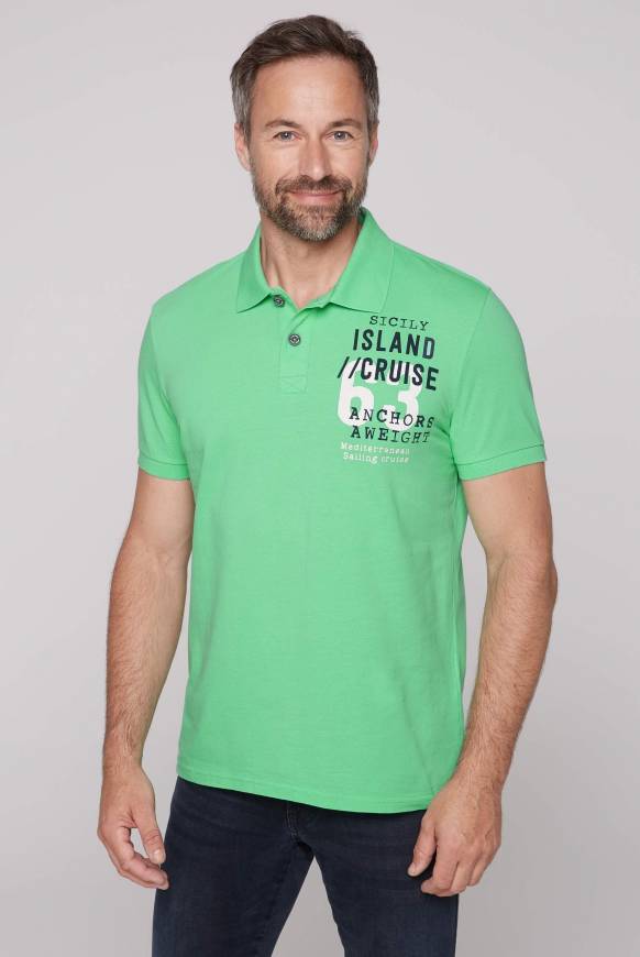 Soccx Kurzarmpolo aus Pikee mit Label Print regatta green