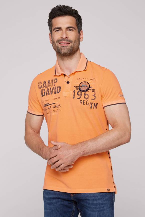 Soccx Pikee-Polo mit Logo-Applikationen sunrise orange
