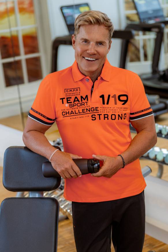 Soccx Pikee-Polo mit Flockprint signal orange