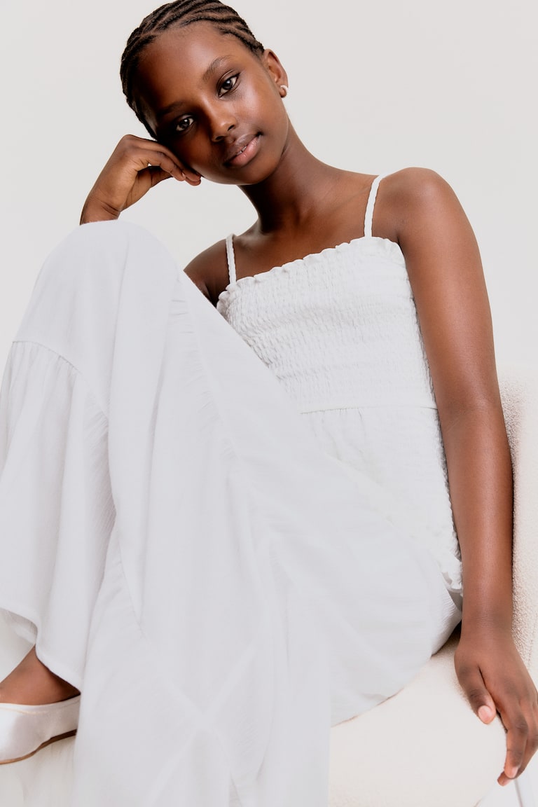 H&M Gesmokter Stufenrock