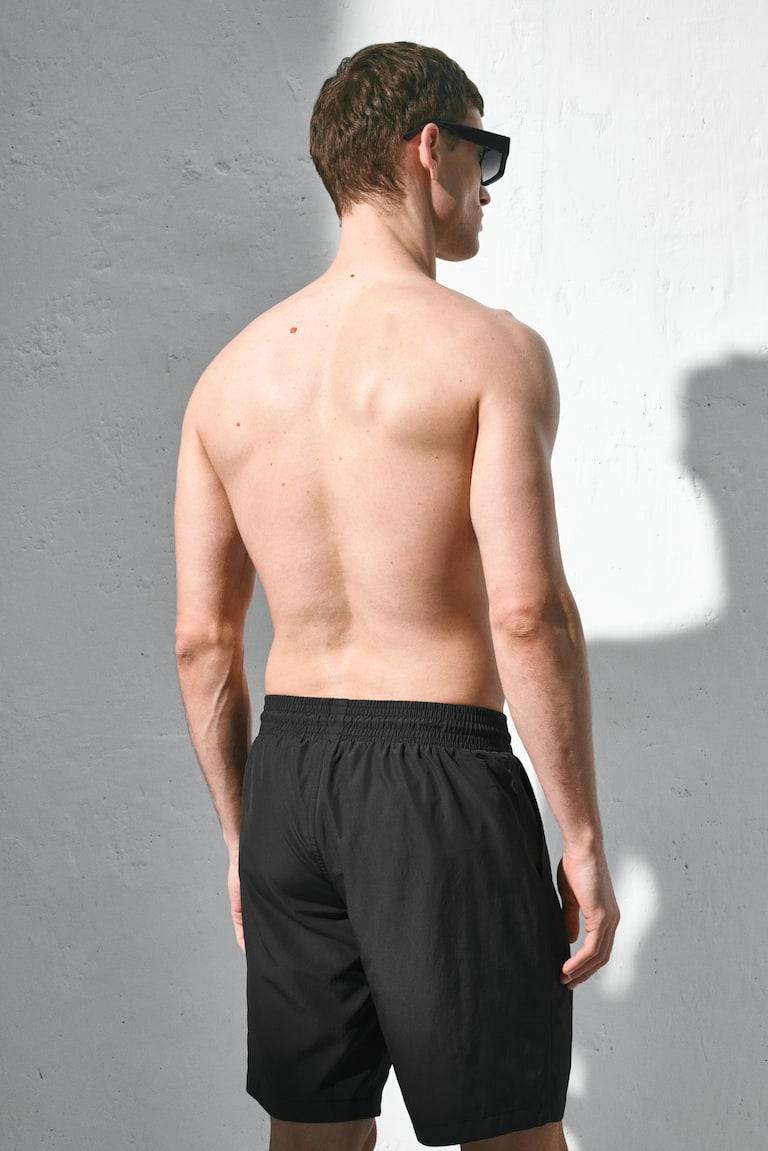 H&M Knielange Badeshorts