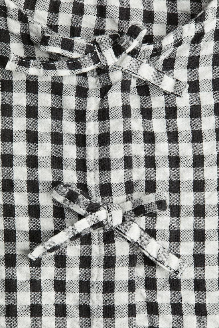 H&M Peplumbluse Aus Baumwoll-Seersucker