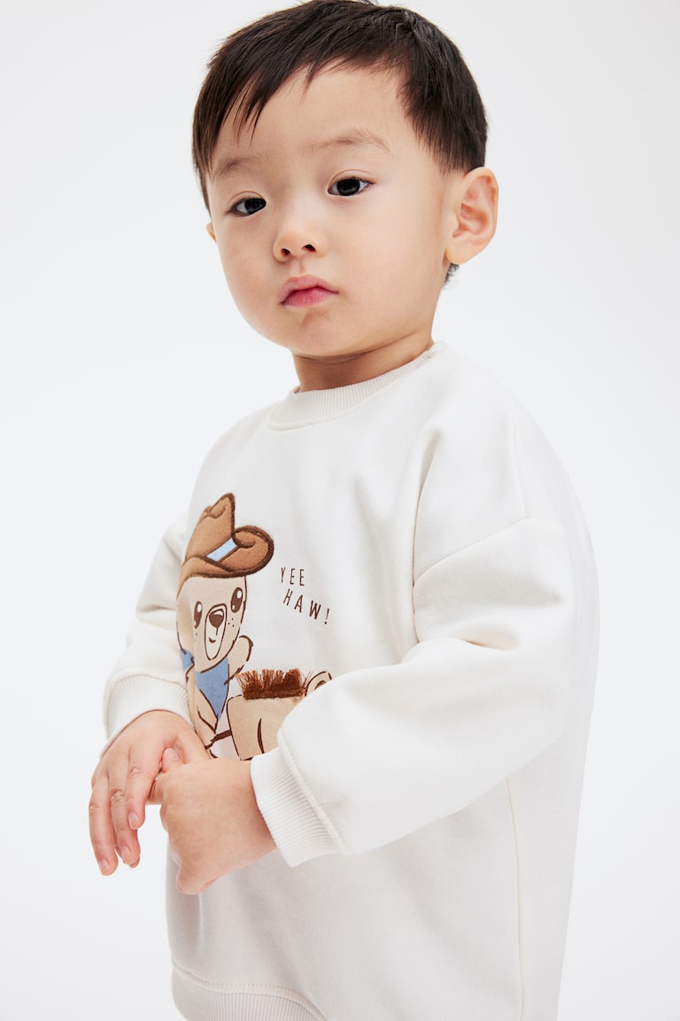 H&M Sweatshirt Mit Motiv