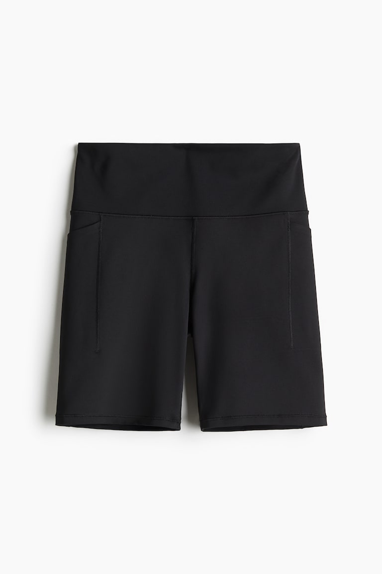 H&M Sport-Radlershorts mit DryMove™ und Taschendetail