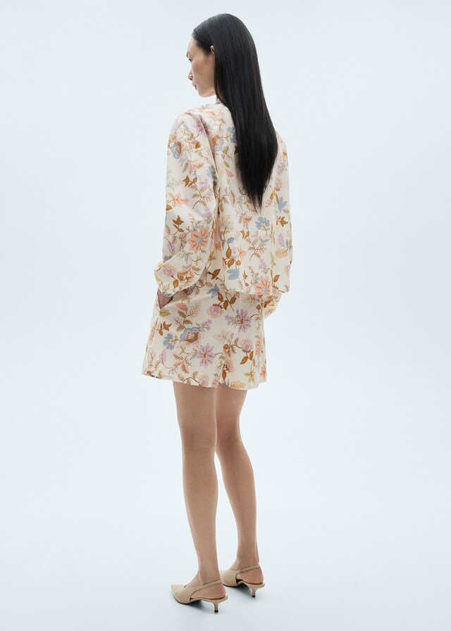 Mango Geblümte Bundfaltenshorts