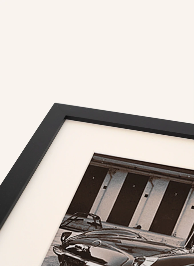 JACOB BADEN JACOB BADEN Wandbild STEVE MCQUEEN IN SEINEM JAGUAR Mit Rahmen