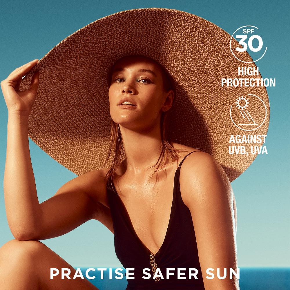 Lookfantastic Garnier Ambre Solaire Ideal Bronze Unsichtbares Bräunungsspray Für Gesicht Und Körper LSF 30 150 ml