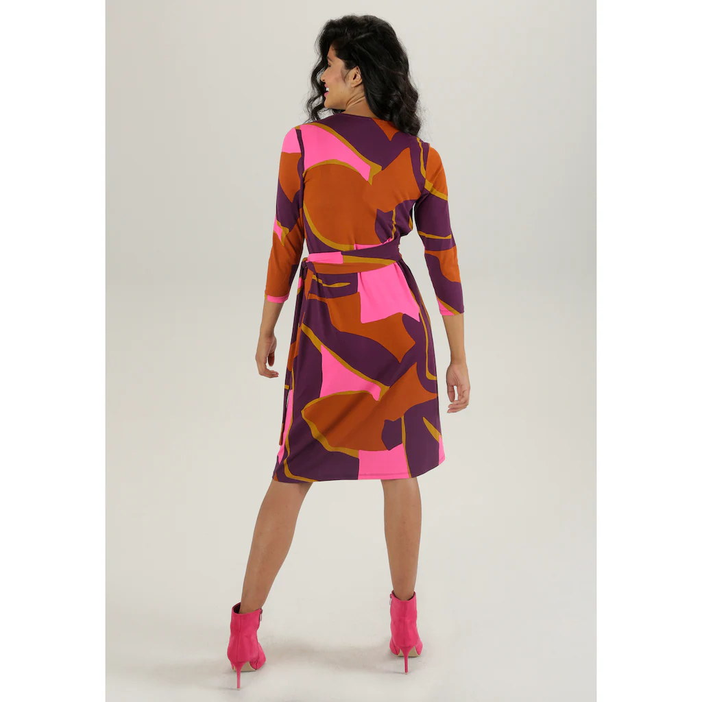 Aniston SELECTED Jerseykleid Mit Verführerischem Ausschnitt Und Trendy Druck