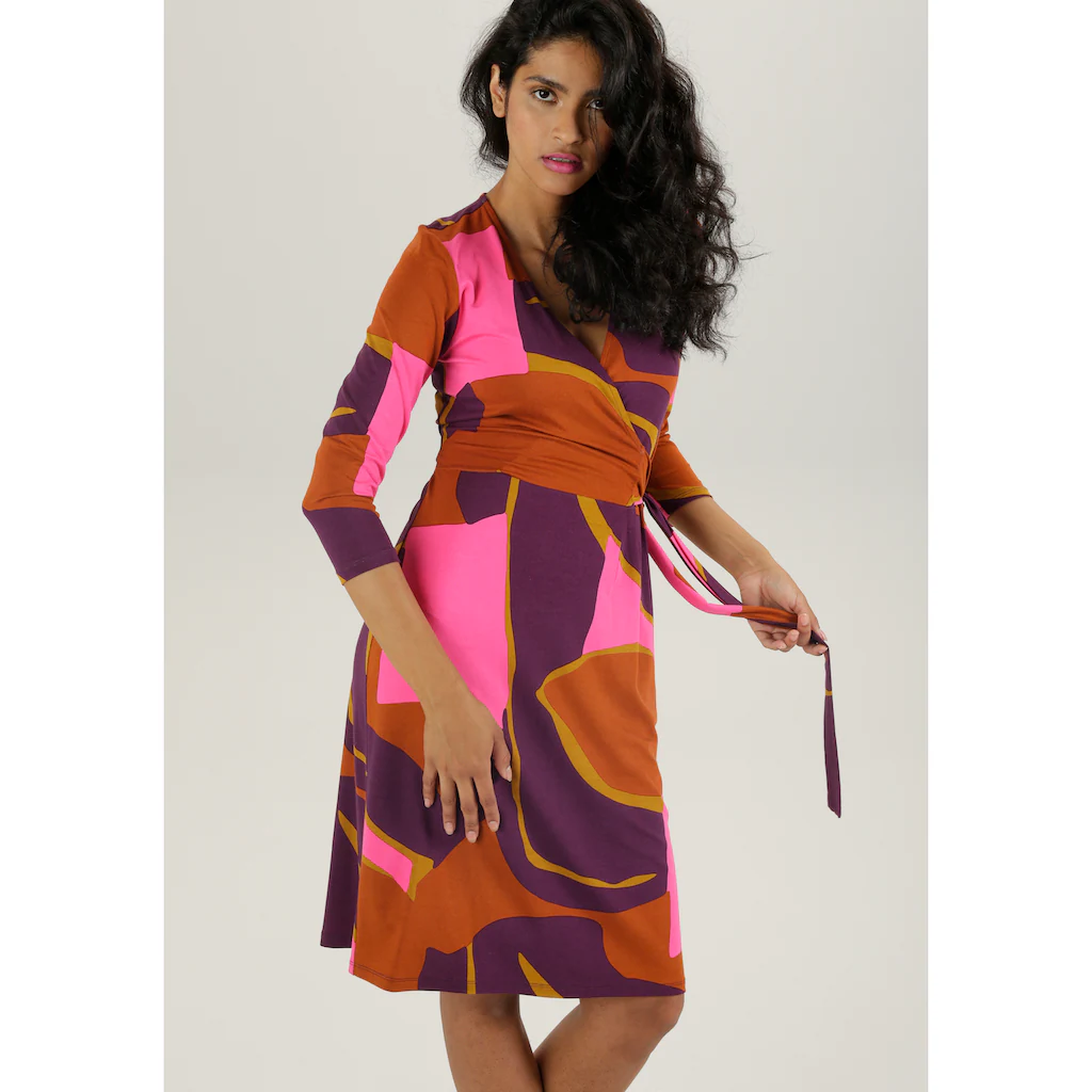 Aniston SELECTED Jerseykleid mit verführerischem Ausschnitt und trendy Druck