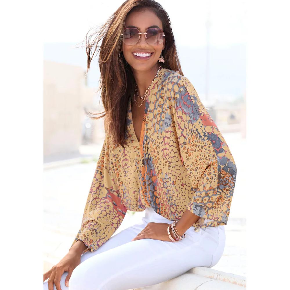 Buffalo Fledermausshirt mit Animaldruck lockere Bluse mit V-Ausschnitt Blusenshirt