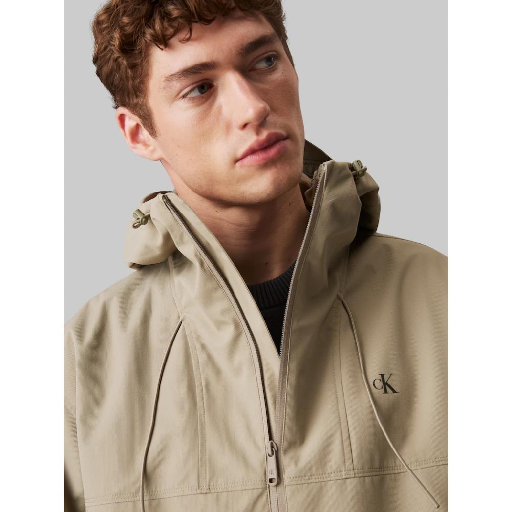 Calvin Klein Jeans Allwetterjacke »TECHNICAL JACKET« Mit Kapuze Logodruck Eingriffstaschen ▷ Kaufen