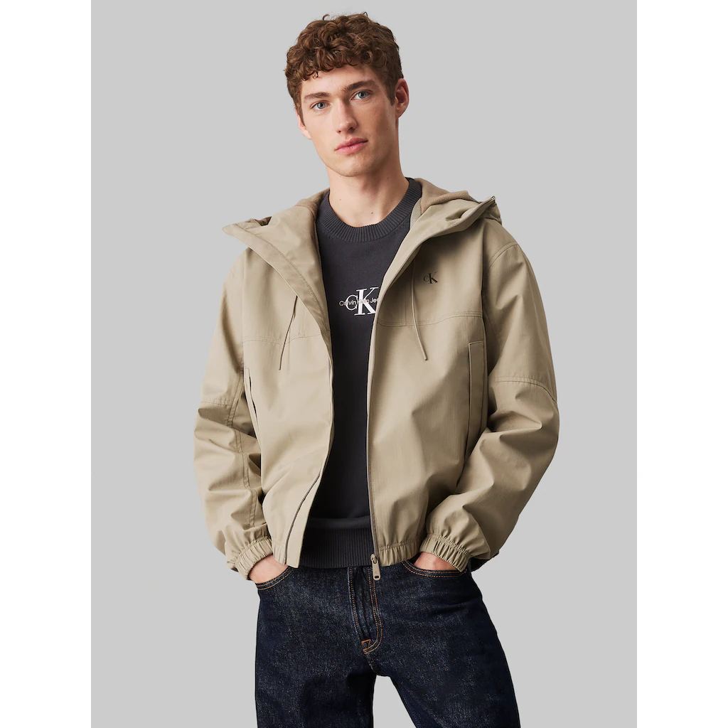 Calvin Klein Jeans Allwetterjacke »TECHNICAL JACKET« mit Kapuze Logodruck Eingriffstaschen ▷ kaufen