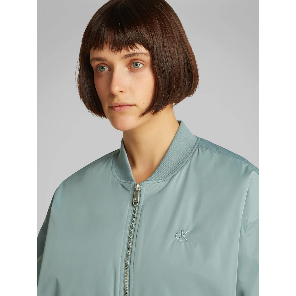 Calvin Klein Jeans Bomberjacke »LONG BOMBER« Mit Logodruck Rumpfabschluss Verengt Durch Gummizug