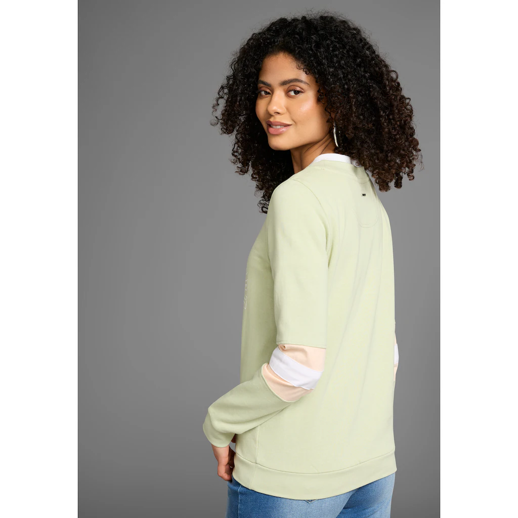 KangaROOS Sweatshirt Langarm Figurumschmeichelnde Passform Bedruckte Optik