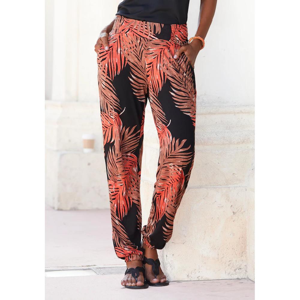 LASCANA Strandhose mit Palmenblätterdruck und Taschen leichte und elastische Jerseyhose