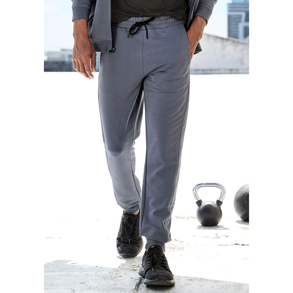 le jogger® Sweatpants mit farblichen Einsatz und Reißverschlusstaschen ▷ für
