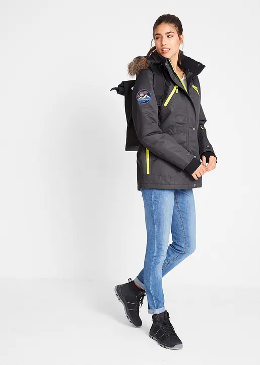 Bonprix Praktische Regenjacke Mit Abnehmbarer Kapuze Sowie Abnehmbarem Fellimitat Und Verschließbaren Taschen