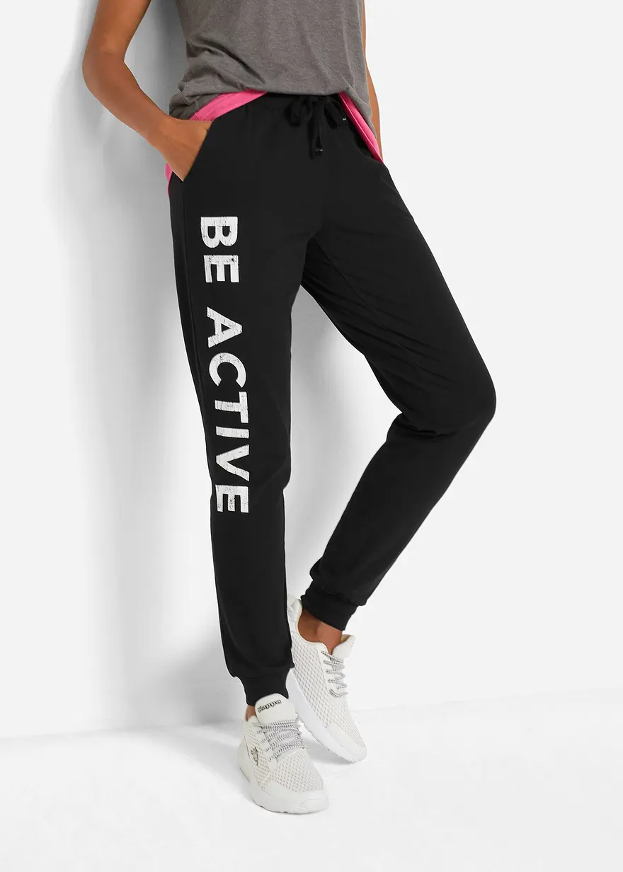 Bonprix Weite Baumwoll-Jogginghose Aus Einem Stretch-Material Mit Eingriffstaschen Und Motivierendem Aufdruck